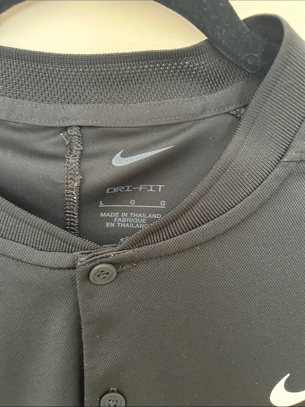 Nike Black Short-Sleeve Athletic Polo with White Swoosh - Picture 2 of 3
